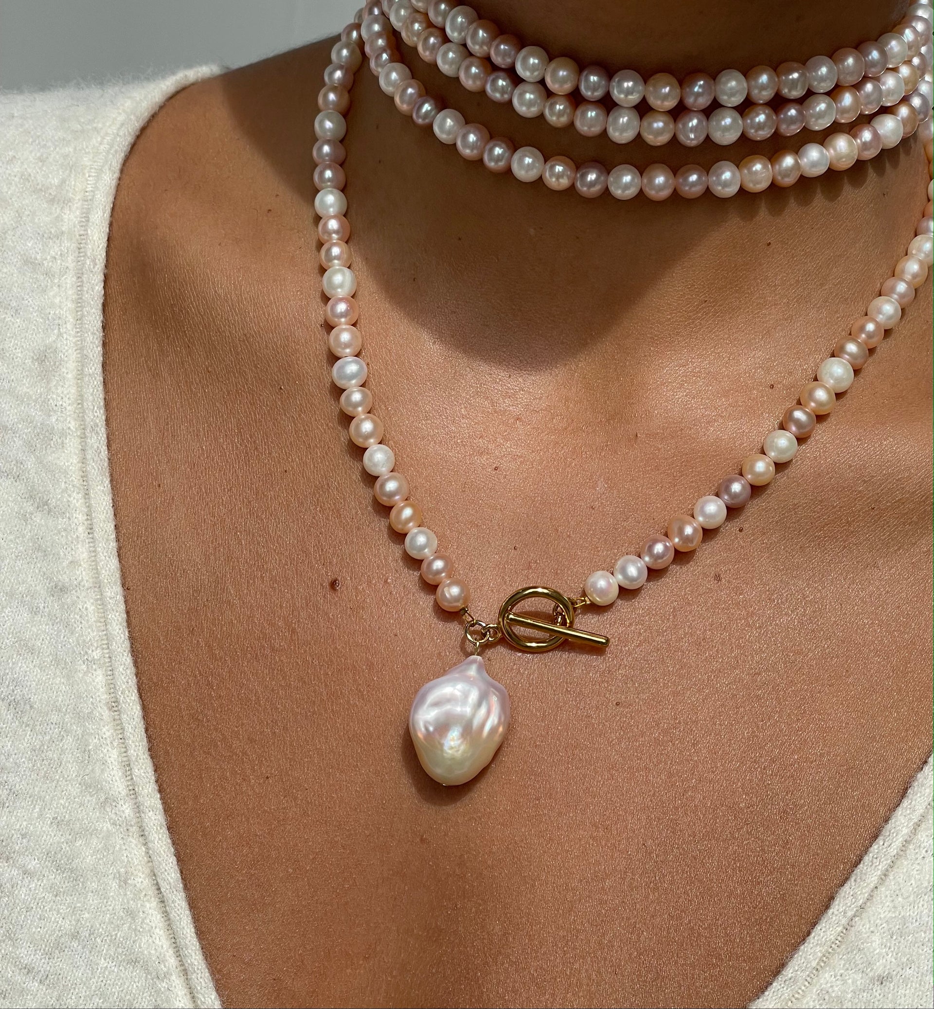 A  Beautiful Pearl Charm That Can Be Worn As A Necklace Too